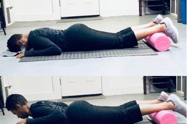 Demonstrating a forward flex exercise.