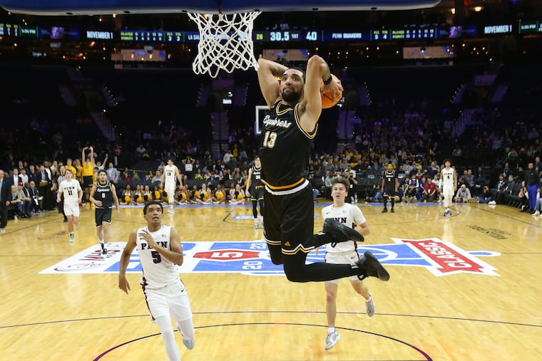 Daeshon Shepherd of La Salle goes up for a dunk against Penn during the Big Five Classic on Dec. 2 at the Wells Fargo Center.