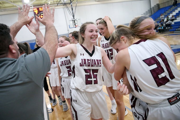 Garnet Valley's Abbey Anderson (25) celebrates with her teammates after winning their PIAA District 1, Class 6A girls basketball semifinal game against Spring-Ford at Bensalem High School in Bensalem, Pa., on Wednesday, Feb. 27, 2019.