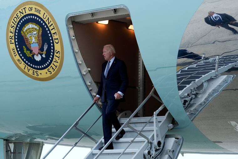 President Joe Biden walks down the steps of Air Force One at John F. Kennedy International Airport in New York on Sunday.