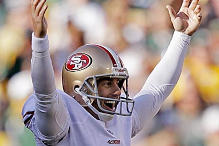 49ers kicker David Akers tied the NFL record for longest field goal by hitting a 63-yarder against the Packers. (Jeffrey Phelps/AP)