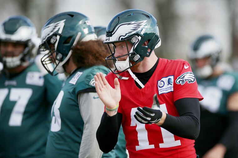 Carson Wentz has taken on the brunt of the criticism for the Eagles' troubled offense.