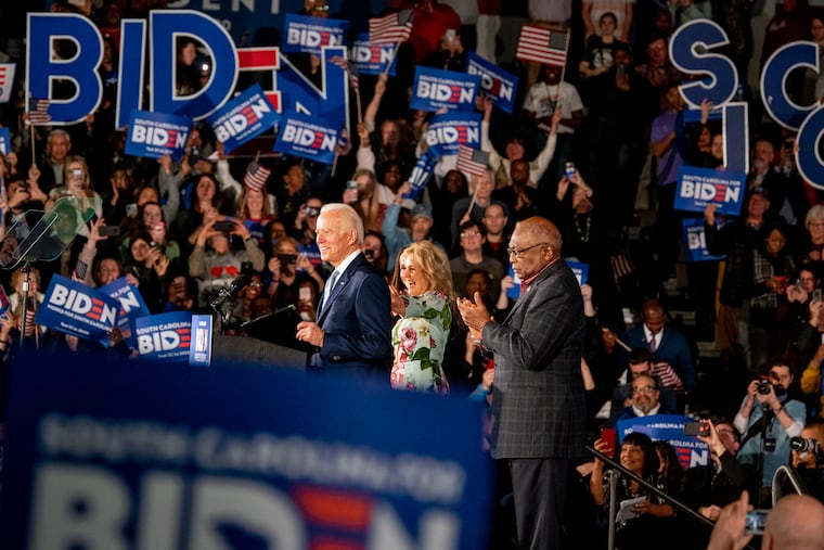 Then-presidential candidate Joe Biden celebrated his victory in the South Carolina primary with his wife, Jill, and U.S. Rep. Jim Clyburn in February 2020. The state's Black voters were crucial to Biden's efforts to secure the Democratic nomination.