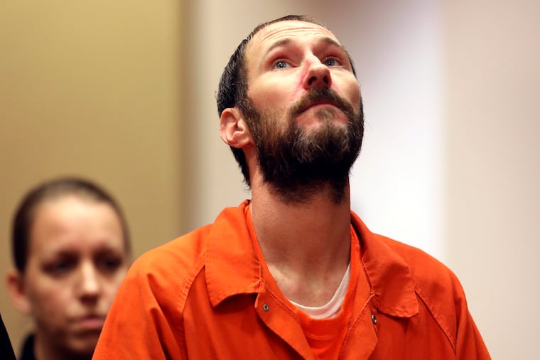 File - In this Dec. 14, 2018, file photo, Johnny Bobbitt stands during a hearing Burlington County Courthouse in Mt. Holly, N.J. Bobbitt will be released from county jail and live in his apartment in Philadelphia. Prosecutors say Bobbitt conspired with Katelyn McClure and her former boyfriend, Mark D'Amico, to concoct a feel-good story about Bobbitt giving McClure his last $20 when her car ran out of gas. They raised $400,000, which authorities say was spent on luxury items and casino trips. This was a top story for New Jersey. (David Swanson/The Philadelphia Inquirer via AP, Pool, File)