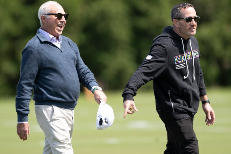 Eagles owner Jeffrey Lurie (left) bought the team for $185 million in 1994. It's now reportedly worth more than 55 times what he paid for it.