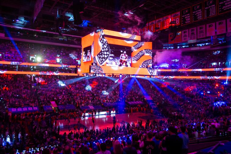 The light show leading up to the starting lineup introductions for a playoff game between the Sixers and Hawks at the Wells Fargo Center in June 2021.