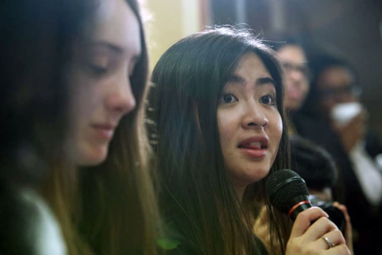 Central High School senior Christine Phan asks the candidates a question during the Student Voices Mayoral Forum. Although still in high school, many of the teens at Tuesday's forum will be of voting age in time for the May primary, or the general election in November. (STEPHANIE AARONSON / STAFF PHOTOGRAPHER)