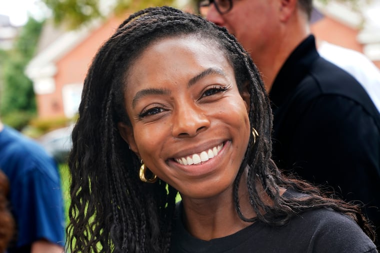 Lindsay Powell, the Democratic candidate in a special election to fill a vacant Pennsylvania House seat, visits with campaign workers on the Northside of Pittsburgh on Sept. 9, 2023.