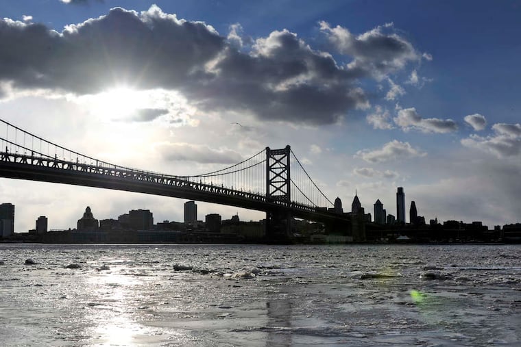 File: A view of the Delaware River and Ben Franklin Bridge from Camden. A new study by Climate Central found that New Jersey has the second highest exposure to potentially flooding toxic sites in the nation along its coasts.