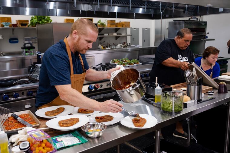 Brad Spence (left) cooks on "Bong Appetit" against Joe Gannascoli and Josephine Polito.