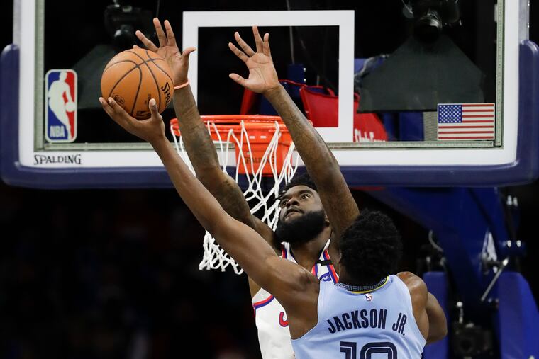 Sixers forward Norvel Pelle (rear) averaged 1.3 blocked shots in 24 games and 4.8 blocks per 36 minutes. He will earn $1.5 million next season.