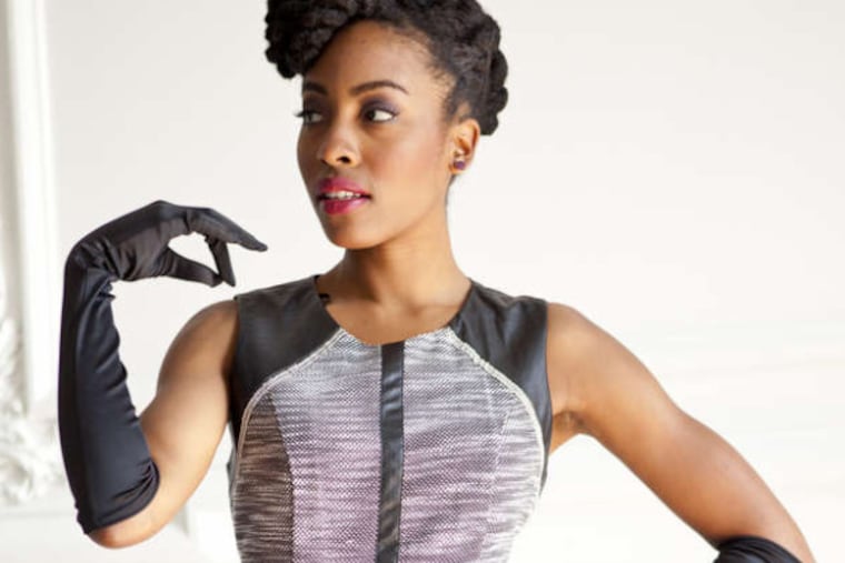 Elbow-length gloves can make anything vogue. ( MICHAEL S. WIRTZ / Staff Photographer )