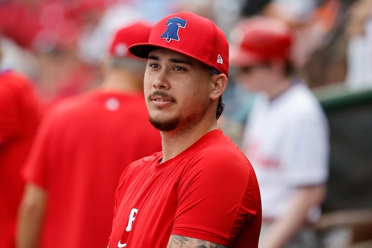 Pitcher Orion Kerkering in the Phillies dugout during a split-squad spring training game against the Pittsburgh Pirates on Monday.