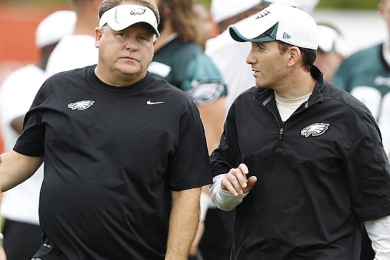 Eagles head coach Chip Kelly (left) and general manager Howie Roseman. (David Maialetti/Staff file photo)