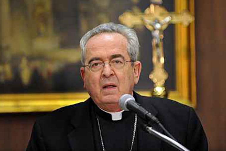 In this file photo, Cardinal Justin Rigali speaks during a news conference. (Sharon Gekoski-Kimmel / Staff)
