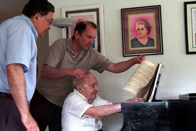 Marian Filar , a virtuoso who survived Buchenwald to perform at Carnegie Hall, is back home, with friends Charlie Birnbaum (left) and Rollin Wilber. (Juliana Schatz/Staff)
