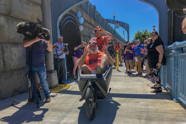 Members of the Bicycle Coalition of Greater Philadelphia make their way across the Ben Franklin Bridge from Camden, shortly after the ceremonial opening of a new ramp. One of the first to cross was John Dowlin, the founder of the Bicycle Coalition of Philadelphia, pushed by Simon Firth.