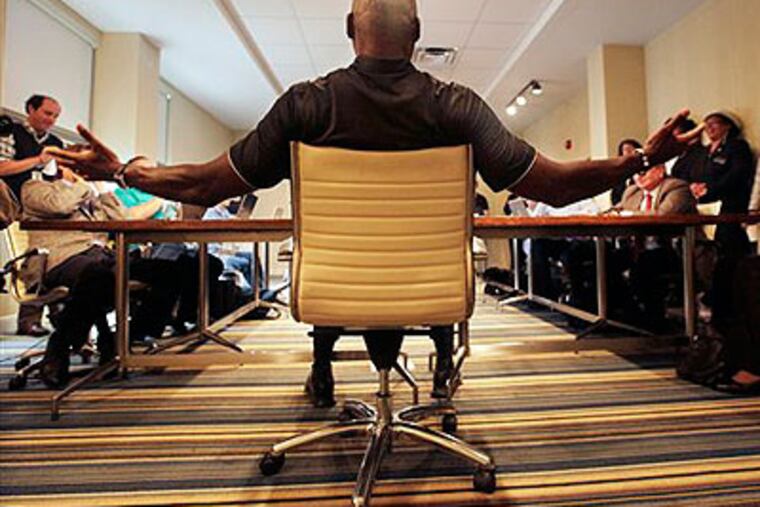 Nine-time Olympic gold medalist Carl Lewis answers a question Friday, Sept. 23, 2011, in Evesham, N.J., after he said that he gave up on his race for New Jersey state Senate, a day after a federal appeals panel removed him from the ballot because he didn't meet a four-year residency requirement. Thursday's ruling came with less than seven weeks before the Nov. 8 election and just as ballots are to be printed and sent out, first to voters overseas, then to others. (AP Photo / Mel Evans)