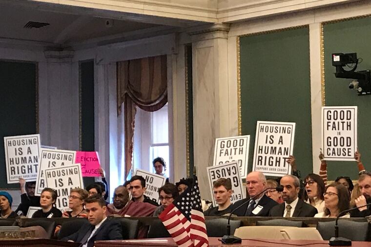 Advocates for just cause eviction legislation in City Council chambers earlier this year.