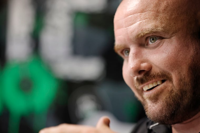 Former pro wrestler Donnie Hart smiles while doing his podcast in a Gloucester Twp. studio on May 25, 2022.