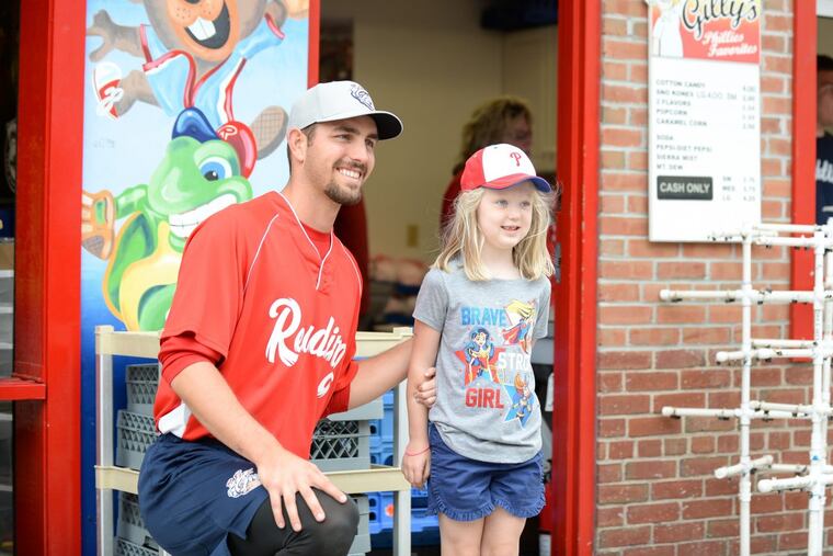 Phillies pitcher Austin Davis poses with a fan. Austin Sullivan/Reading Fightin Phils