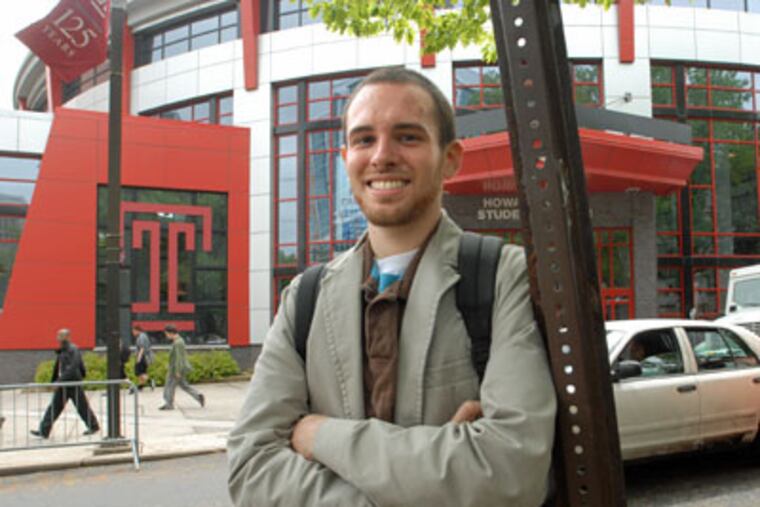 Temple senior Kevin Paris, 27, of Blakely, near Scranton, whose parents insist he get an interim health insurance policy before the start of his Teach for America job. (April Saul / Staff Photographer)