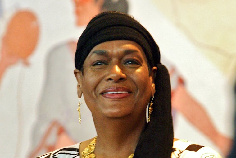 Khadijah Farrakhan, wife of Nation of Islam leader Louis Farrakhan, stands before members of the 20th Navajo Nation Council Wednesday, July 19, 2006 in Window Rock, Ariz.