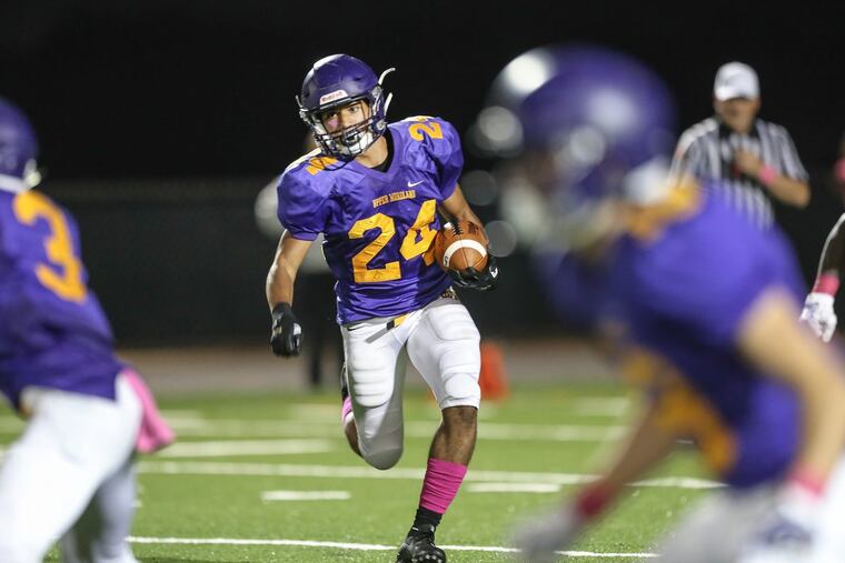 Upper Moreland’s Caleb Mead on a 70 yard TD run against Quakertown during the first quarter in Willow Grove.