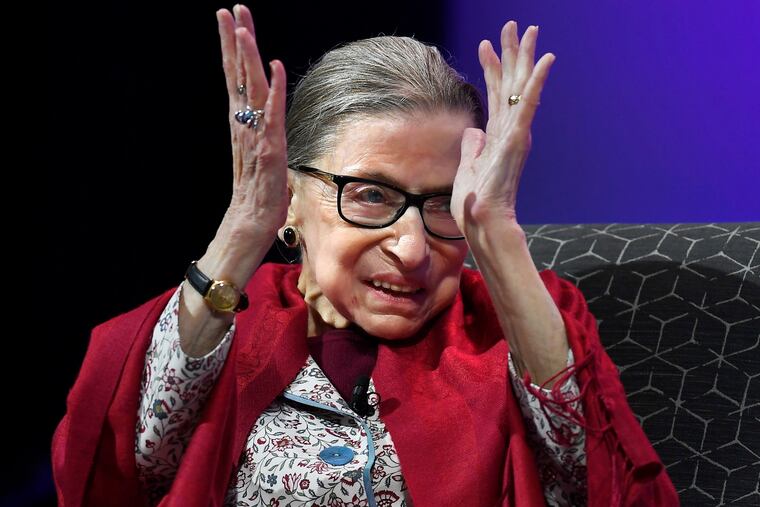 In this Oct. 3, 2019 photo, U.S. Supreme Court Justice Ruth Bader Ginsburg claps after listening to students sing opera at Amherst College in Amherst, Mass. Supreme Court Justice Ruth Bader Ginsburg is the winner of this year's $1 million Berggruen Prize for philosophy and culture. The award announced Wednesday by the Los Angeles-based Berggruen Institute honors Ginsburg for her pioneering legal work for gender equality and her support for the rule of law. The institute says Ginsburg will direct the money to charity. (AP Photo/Jessica Hill)