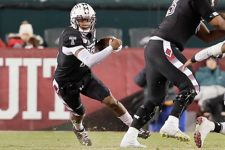 Temple quarterback Todd Centeio looks for running room in the fourth quarter against UConn.