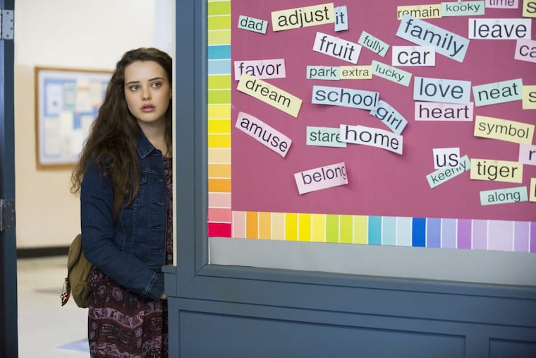 This image released by Netflix shows Katherine Langford in a scene from the series, “13 Reasons Why,” about a teenager who commits suicide.