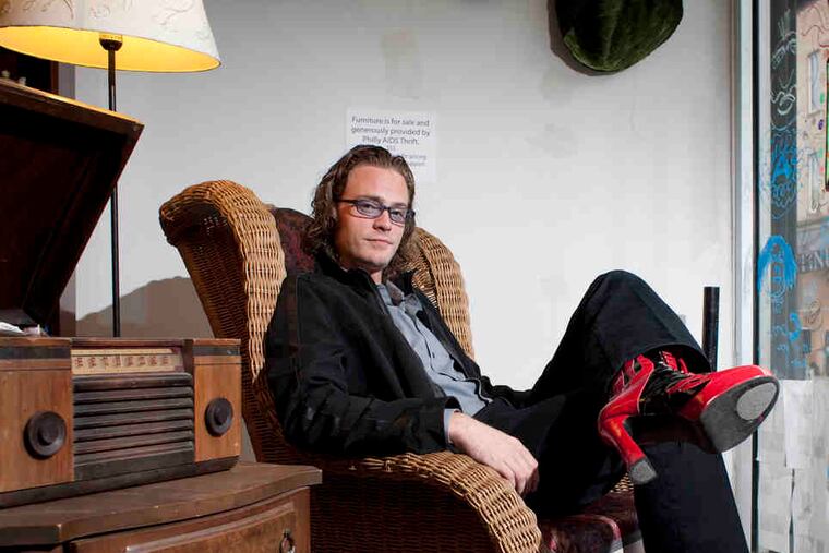 Greg DeCandia , BCKSEET Productions founder, in his "Ziggy Stardust" boots at Creative Co-Op on South Street, the troupe's home since its Society Hill Playhouse residency ended.