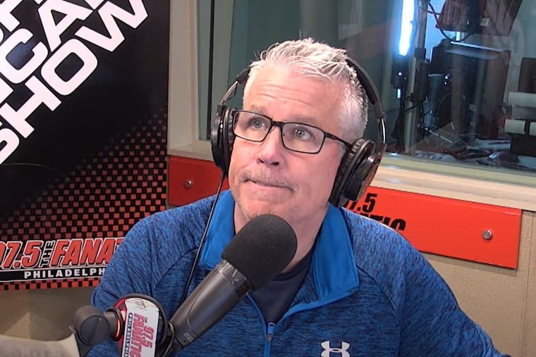 97.5 The Fanatic host John Kincade looks on as fire alarms begin to sound during his show Tuesday morning.