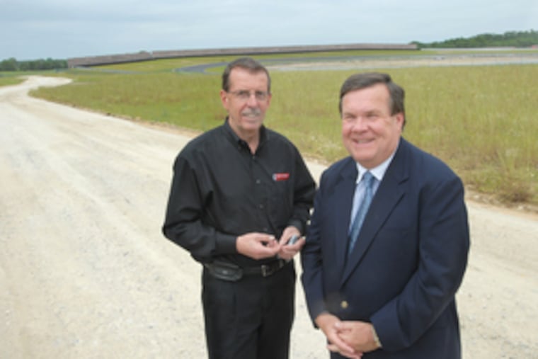 Park general manager Donald Fauerbach (left) and Millville Mayor James Quinn at the New Jersey Motorsports Park, which Quinn says will be the "Disneyland of Millville."