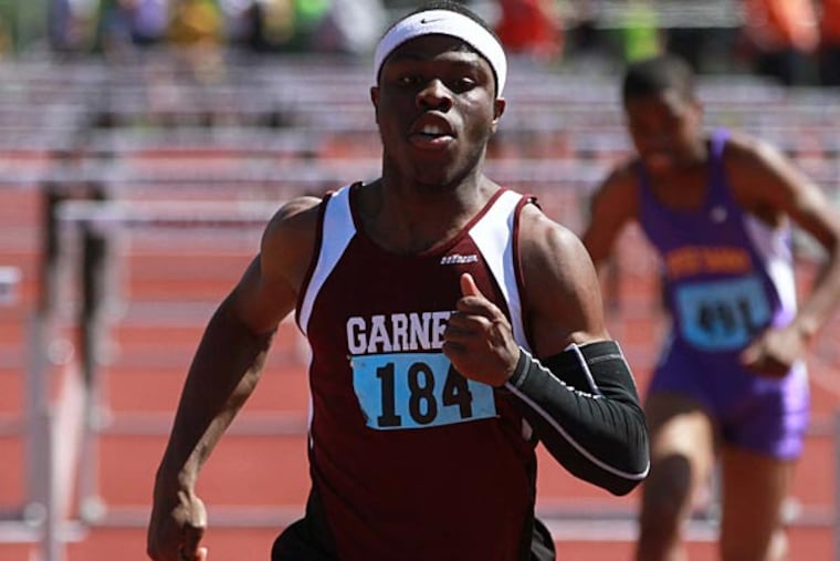 Garnett Vaelley's Wellington Zaza wins the 110 meter hurdles heat on
the first day of the two-day PIAA Class AAA and AA track and field
championships at Coatesville.May 17, 2013. (David Swanson / Staff
Photographer)