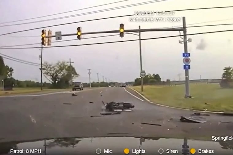 Image from Springfield Township police video showing the crashed motorcycle after it was pursued by Mark Campagna, a detective with the New Jersey State Police. Campagna was found guilty of endangering Omar Kebbabi, who died in the crash.