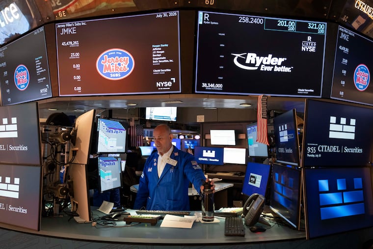 Specialist Mark Fitzgerald works on the floor of the New York Stock Exchange on Thursday in New York. (AP Photo/Yuki Iwamura)