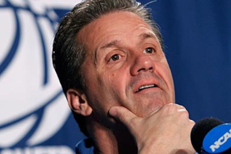 Kentucky coach John Calipari answers questions at news conference on Saturday. (Mel Evans/AP Photo)