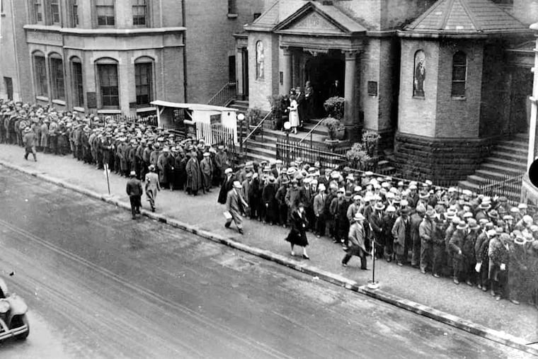 The unemployed line up in sub-zero weather at a city relief kitchen set up in New York on Jan. 30, 1934, during the Great Depression. Eleven million Americans were unemployed at one point.