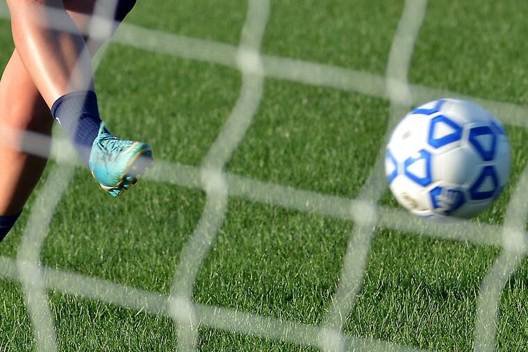 Washington Township High School soccer player Natasha Munro puts a shot on goal practicing with the team at the school on Monday September 4,2017. MARK C PSORAS/For the Inquirer