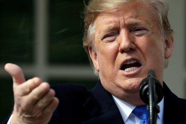 President Donald Trump speaks as he declares a national emergency in order to build a wall along the southern border on Friday.