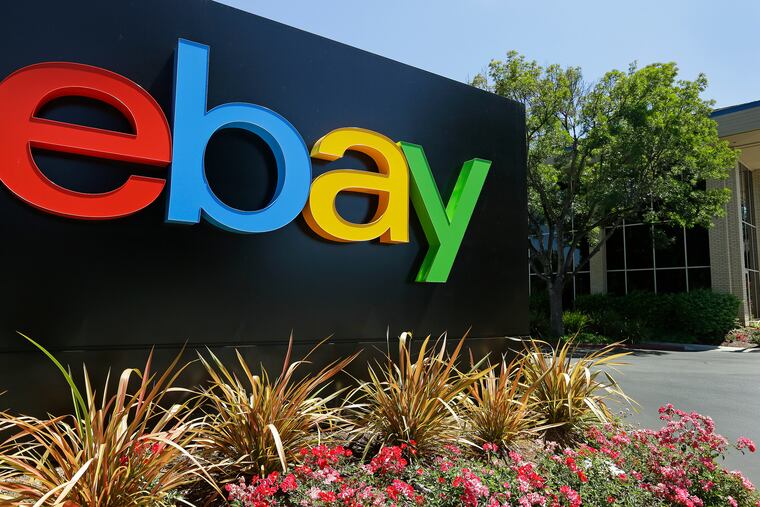 FILE - This Tuesday, July 16, 2013, file photo shows signage at eBay headquarters in San Jose, Calif. (AP Photo/Ben Margot, File)