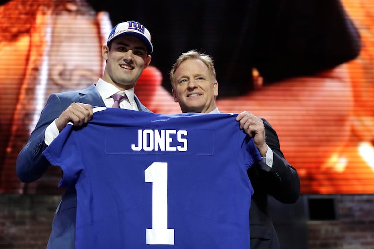 Duke quarterback Daniel Jones poses with NFL Commissioner Roger Goodell after the New York Giants selected Jones in the first round at the NFL draft on Thursday.