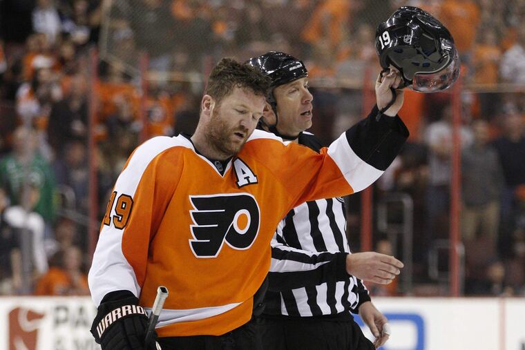 Scott Hartnell tips his helmet to the cheering crowd after being penalized for spearing.
