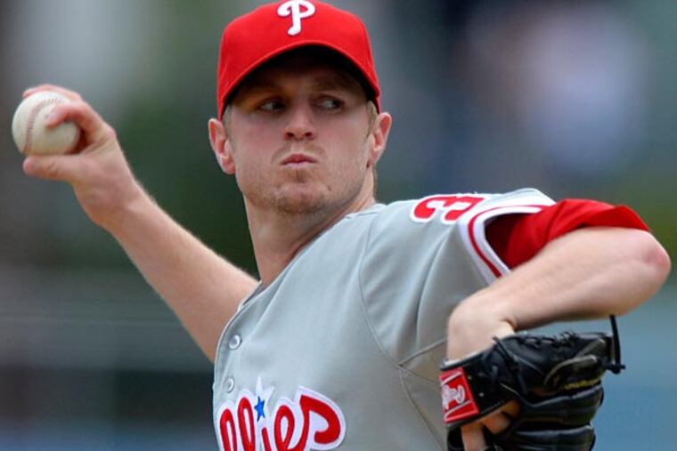 Kyle Kendrick was diagnosed with a mild concussion after the Phillies' loss to the Dodgers on Sunday. (Mark J. Terrill/AP)