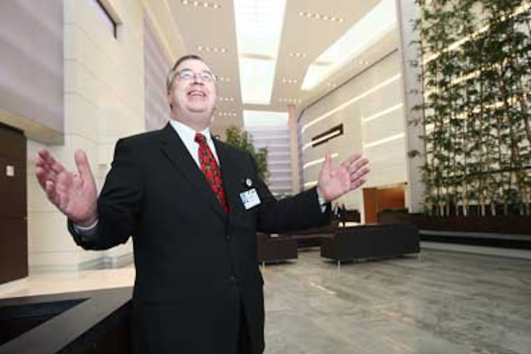 John Sheridan, CEO of Cooper Hospital, talks about why they used a great deal of window light in the construction of the new Pavilion. (Michael Bryant / Staff)