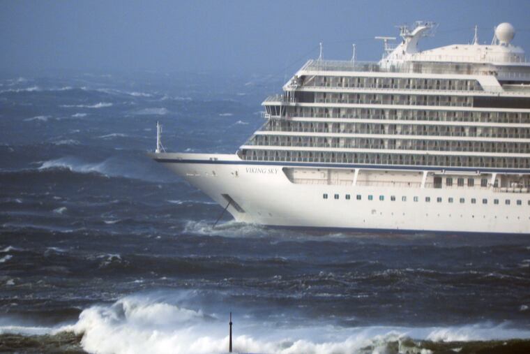 The cruise ship Viking Sky lays at anchor in heavy seas, after it sent out a Mayday signal because of engine failure in windy conditions, near Hustadvika, off the west coast of Norway, Saturday March 23, 2019. The Viking Sky is forced to evacuate its 1,300 passengers.