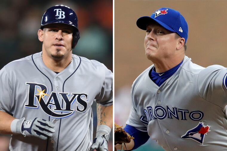 The Phillies added Wilson Ramos (left) from the Rays and Aaron Loup from the Blue Jays at the cusp of the trade deadline.