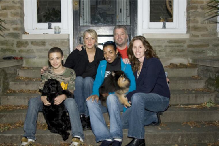 The survivors and their humans. From left, Cain Nicholls with Dash, Jennifer Nicholls, heroine Fran Smith with Sparky, Stevie Cunningham, and Linda Panetta.