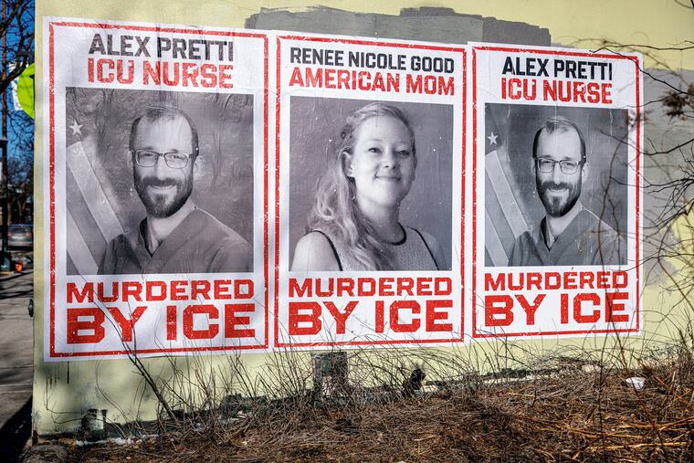 Posters depicting Alex Pretti and Renee Nicole Good are displayed on a wall near the site where Pretti, a 37-year-old ICU nurse, was fatally shot by federal immigration agents, in Minneapolis, Minn., Jan. 29, 2026.